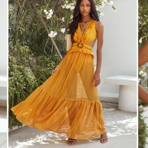 This dress is from VICI. It is a size small and comfortable to wear!